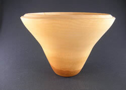 Natural edge cherry bowl turned by Dennis Curtis.