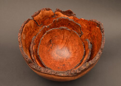 Nested set of 3 natural-edge, cherry burl bowls, turned from a single burl.  Wild burl grain, bark inclusions, and rich cherry color are simply stunning.  Largest 11" diameter, 7" height turned by Dennis Curtis.